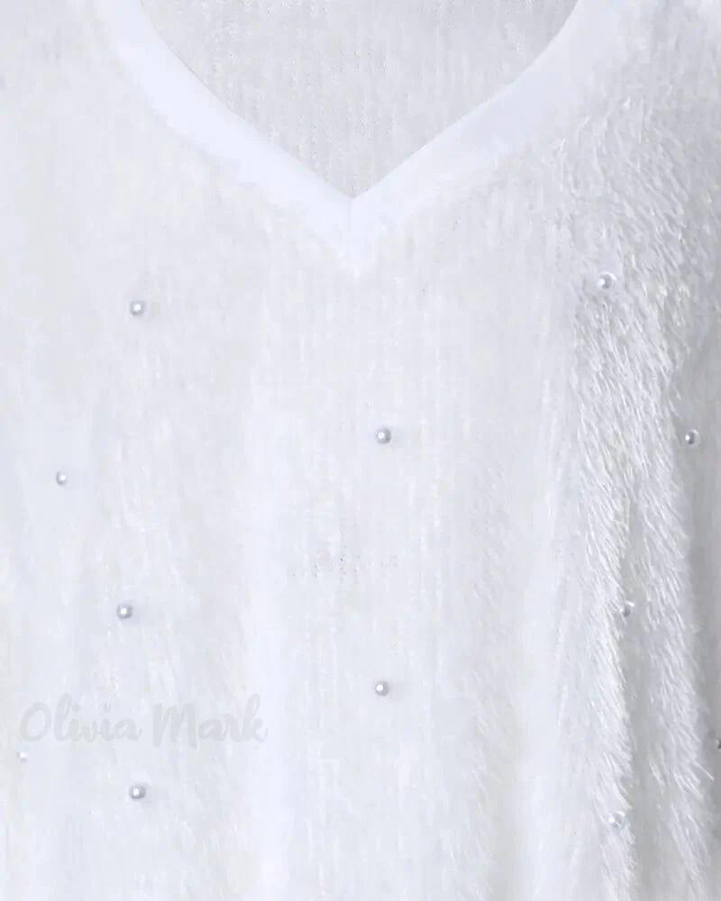 Helge | Strickpullover mit V-Ausschnitt und Perlendetails
